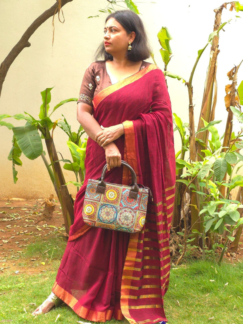 Bulbul - Maroon Linen Saree with Copper Zari border