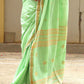 Pavana – Mint Green Cotton Saree with Copper Zari Fish Motifs and Striped Pallu