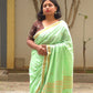Pavana – Mint Green Cotton Saree with Copper Zari Fish Motifs and Striped Pallu