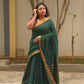 Qala - Green Linen Saree with Copper Zari border