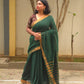 Qala - Green Linen Saree with Copper Zari border