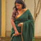 Qala - Green Linen Saree with Copper Zari border