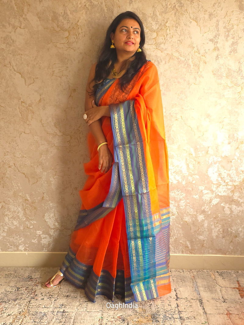 Tamhini: Pure kota doria cotton sarees with exquisite zari chit border ( Fire Orange )