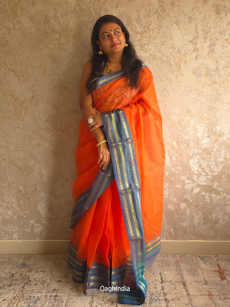 Tamhini: Pure kota doria cotton sarees with exquisite zari chit border ( Fire Orange )