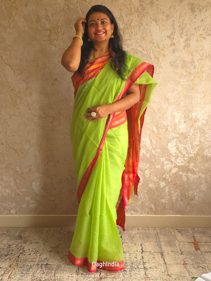 Tamhini: Pure kota doria cotton sarees with exquisite zari chit border ( Parrot Green )