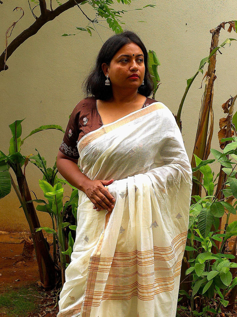 Shubra – Off-White Cotton Saree with Copper Zari Fish Motifs and Striped Pallu