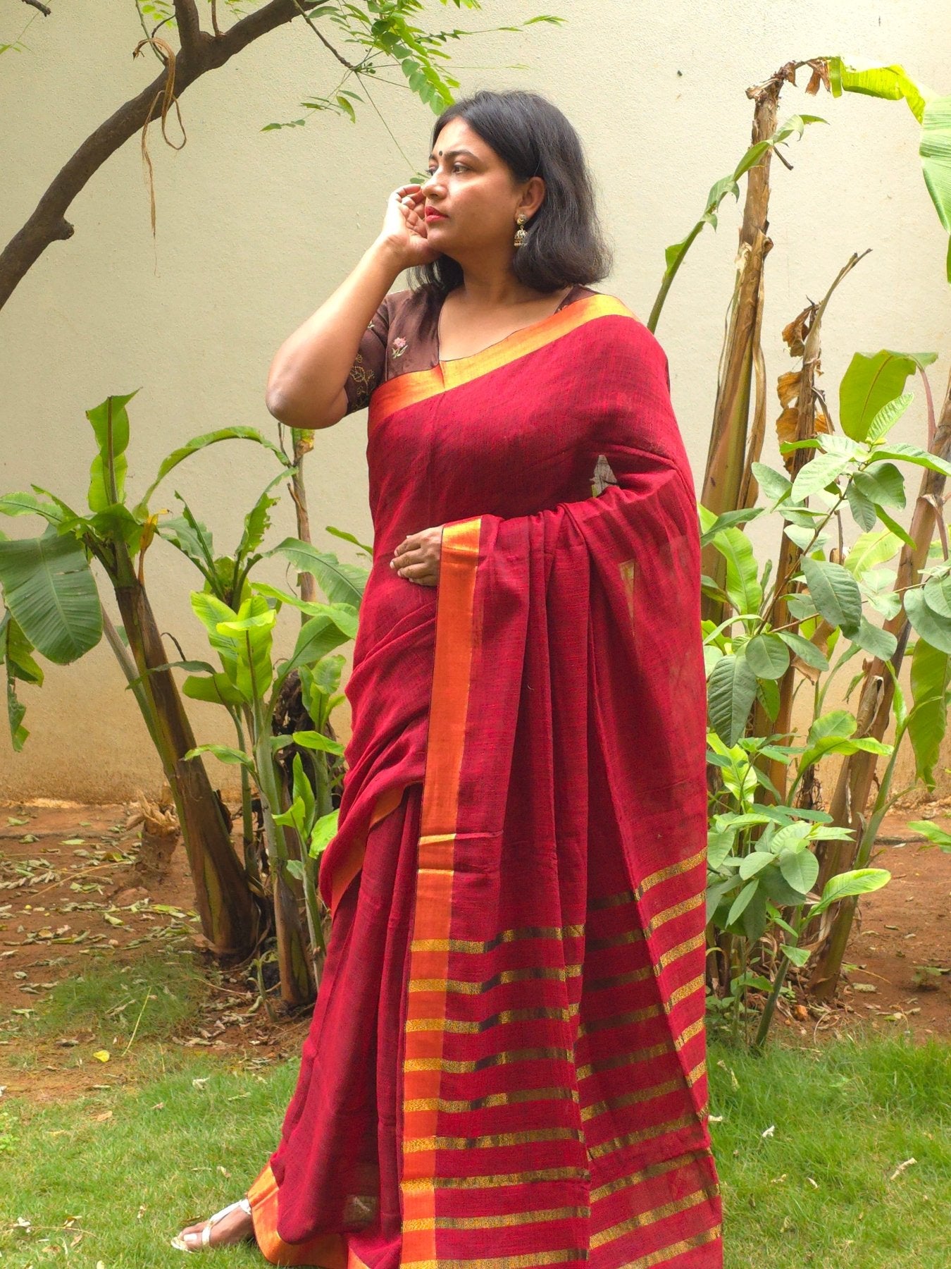Sitara - Red Linen Saree with Copper Zari border
