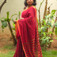 Sitara - Red Linen Saree with Copper Zari border