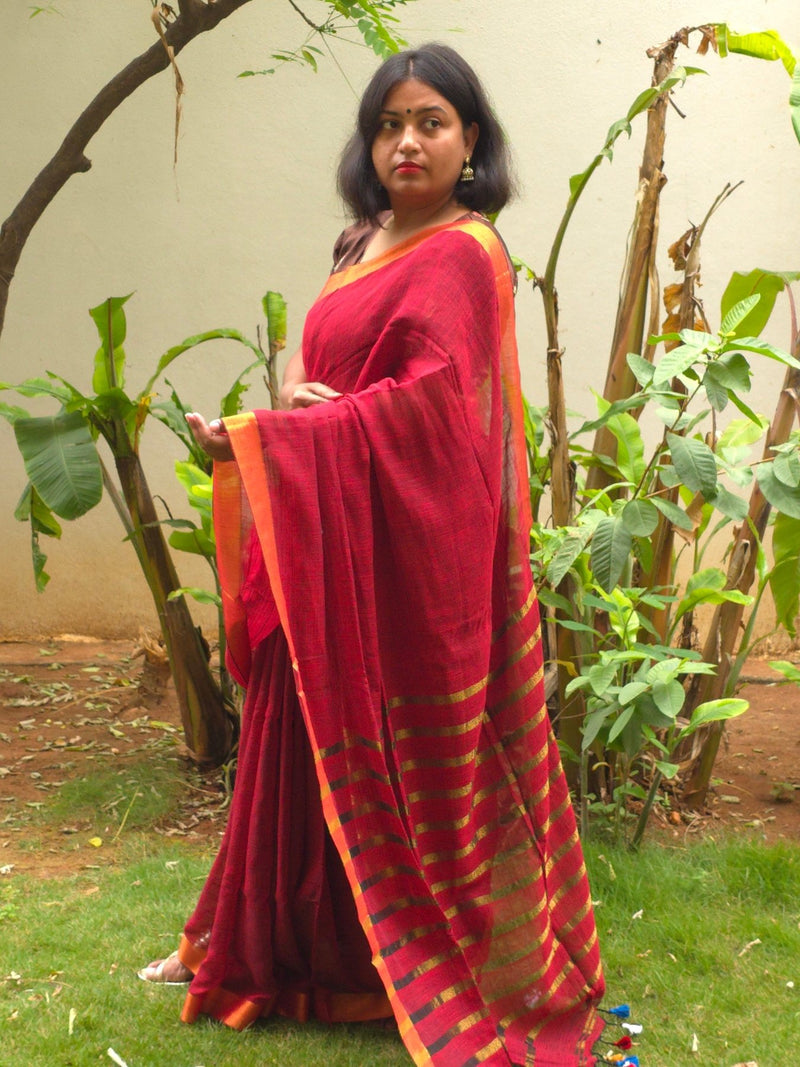Sitara - Red Linen Saree with Copper Zari border