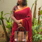 Sitara - Red Linen Saree with Copper Zari border