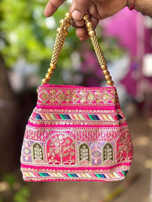 The Jharokha Silk Potli - Rani Pink - Oagh India