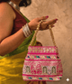 The Jharokha Silk Potli - Rani Pink - Oagh India